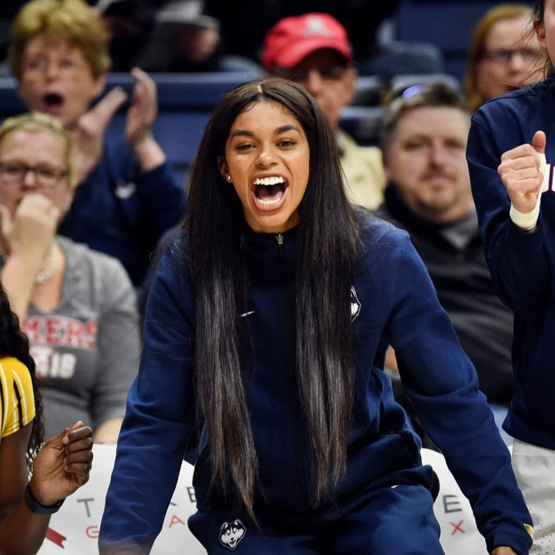 Evina Westbrook cheers at a game
